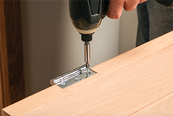 Screw the hinges (Fit an internal door)